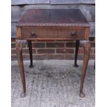 A walnut lamp table, fitted one drawer, on cabriole supports, 21" square