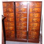 *A mahogany four drawer filing cabinet with brass drop handles, on block base, 17" wide x 27" deep x