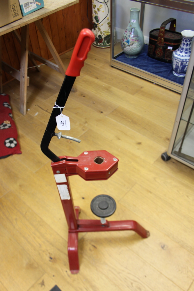 A French painted metal corking press, 25" high