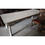 A white painted pine plank top dining table, on tapering supports, 93" x 31"