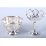 A George V silver sugar bowl with applied Gothic design decoration, on circular base 3 1/2" dia, and