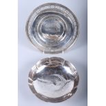 An American sterling silver plate with pierced rim, 9" dia, and a white metal bowl, stamped "Pure