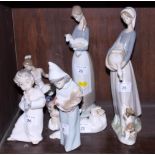 Six Lladro porcelain figures including a ballet dancer and two cherubs