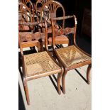 A pair of William IV cane seat bedroom chairs, a bobbin turned nursing chair with cane seat and a
