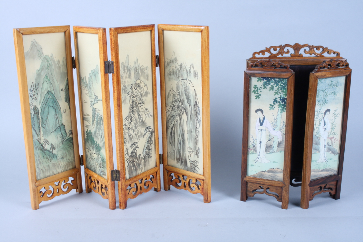 A Chinese hardwood three-panel folding table screen, the panels decorated with figures painted on