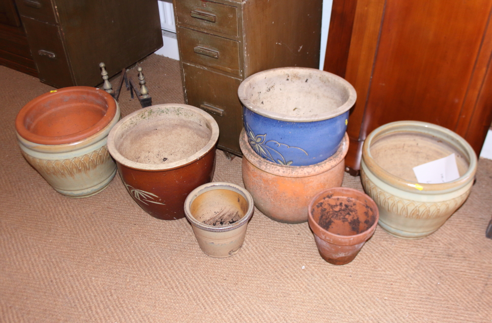 A collection of stoneware and other garden planters, various