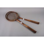 A pair of early laminated wood badminton rackets