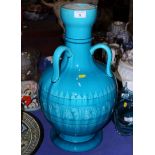 A Burmantofts faience three-handled pottery vase, 22" high