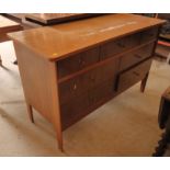 A Vanson late 20th century walnut five drawer chest and matching dressing table