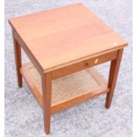 A cherrywood lamp table with an undershelf, 18" wide, an oval dressing stool and an open two-shelf