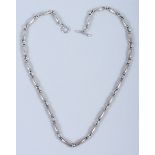 A mid 20th century Georg Jensen No 40 silver necklace with hammered lozenge shaped links and