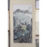 A Chinese watercolour on paper, mountainous village with script and seal mark, 63" long, mounted