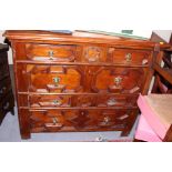 A late 17th century fruitwood chest of two short and three long drawers with fielded panel fronts,