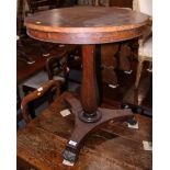 A Victorian circular mahogany occasional table with octagonal baluster stem and triangular base, 24"