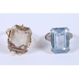 A yellow metal and smoky quartz dress ring and a white metal and pale blue hardstone dress ring