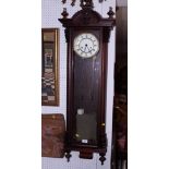 A mahogany cased Vienna regulator wall clock with compensatory pendulum and striking movement, 48"