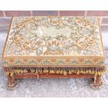 A 19th century needlepoint and velvet covered stool, 24" wide