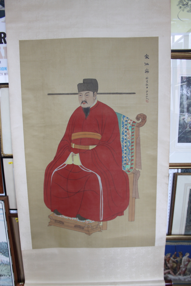 A Chinese scroll painting of a seated emperor, 68" x 32" overall, with original box