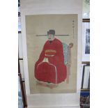 A Chinese scroll painting of a seated emperor, 68" x 32" overall, with original box