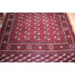 A hand knotted Bokhara carpet of traditional Turkoman design