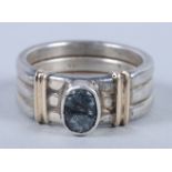 A lady's platinum banded ring set with fractured hardstone, stamped 950, ring size N