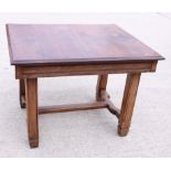 A polished as walnut extending dining table with three extra leaves, on shaped supports, 90" long