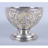 A 19th century silver mounted ostrich egg pedestal bowl with pierced and engraved decoration,