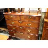 A George III mahogany chest of two short and three long graduated drawers, on bracket feet, 40 1/