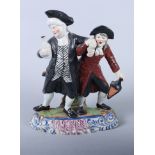 An 18th century Staffordshire model of The Drunken Cleric and his Clerk, on scrollwork base, 9 1/