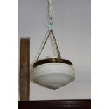 An Edwardian milk glass ceiling light, the pendant bowl with brass mounts, cover and chains, 16" dia