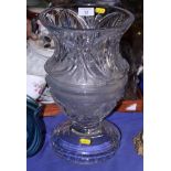 A heavy cut glass pedestal vase with flared rim, 13 1/2" high