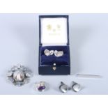 A Niels Erik From ring set amethyst, size P/Q, a pair of modernist silver earrings, a similar pair