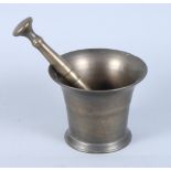 An 18th century bronze pestle and mortar, 4 1/2" high, and a 19th century brass preserve pan with