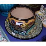 A mid 20th century Gouda pottery charger, richly painted with flowers and abstract pattern, 17" dia,
