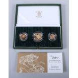 A 2004 gold three coin proof sovereign set, in case