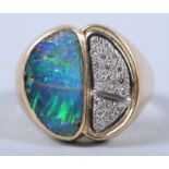 An 18ct gold ring set opal and pave diamonds, ring size V, 13.8g