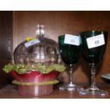 A pair of Victorian green glass wines, a lamp work shallow bowl and a toilet jar and cover