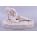 An early 20th century carved alabaster of Dying Gaul, on shaped base, 10 1/2" long (damages)