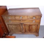 A 19th century mahogany side cabinet, fitted four drawers over cupboards, on bracket feet, 42" wide