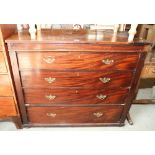 A 19th century Continental mahogany chest of four long drawers, on bun feet, 44" wide