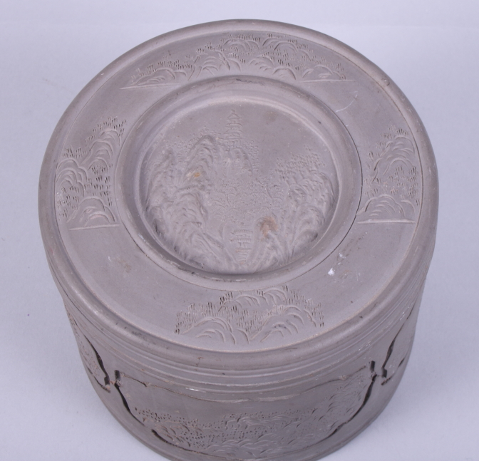 A Chinese Republic period grey stoneware cricket cage, decorated with incised mountain scenes, the - Image 2 of 10