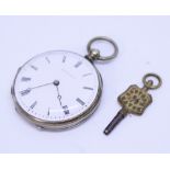 A 19th century silver cased open face pocket watch, by Moulinie Geneve, with key