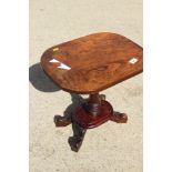 A walnut shape top occasional table, on turned column and quadroform base, 17 1/2" wide