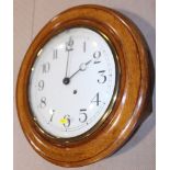 A 19th century oak cased wall clock with painted dial, 18" dia overall