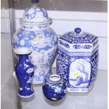 A Chinese blue and white prunus decorated baluster vase, a similar ginger jar, a hexagonal jar and