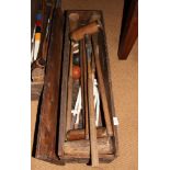 A croquet set, in case with wrought iron hoops