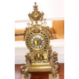 An early 20th century French gilt spelter mantel clock, enamel Roman numerals, twin winding holes