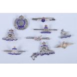 Eight silver an enamelled sweetheart brooches and a silver gilt RAF wings brooch