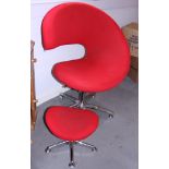 A modern armchair, upholstered in a red woollen fabric, on chrome star base, with a companion stool