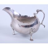 A George III white metal sauce boat, presentation inscription, 4.6oz troy approx